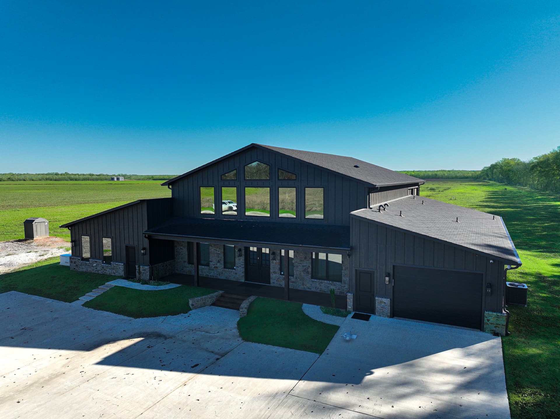 Large black barn-style house