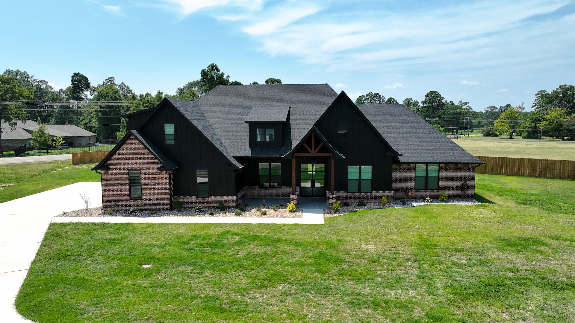Brick home with black accents