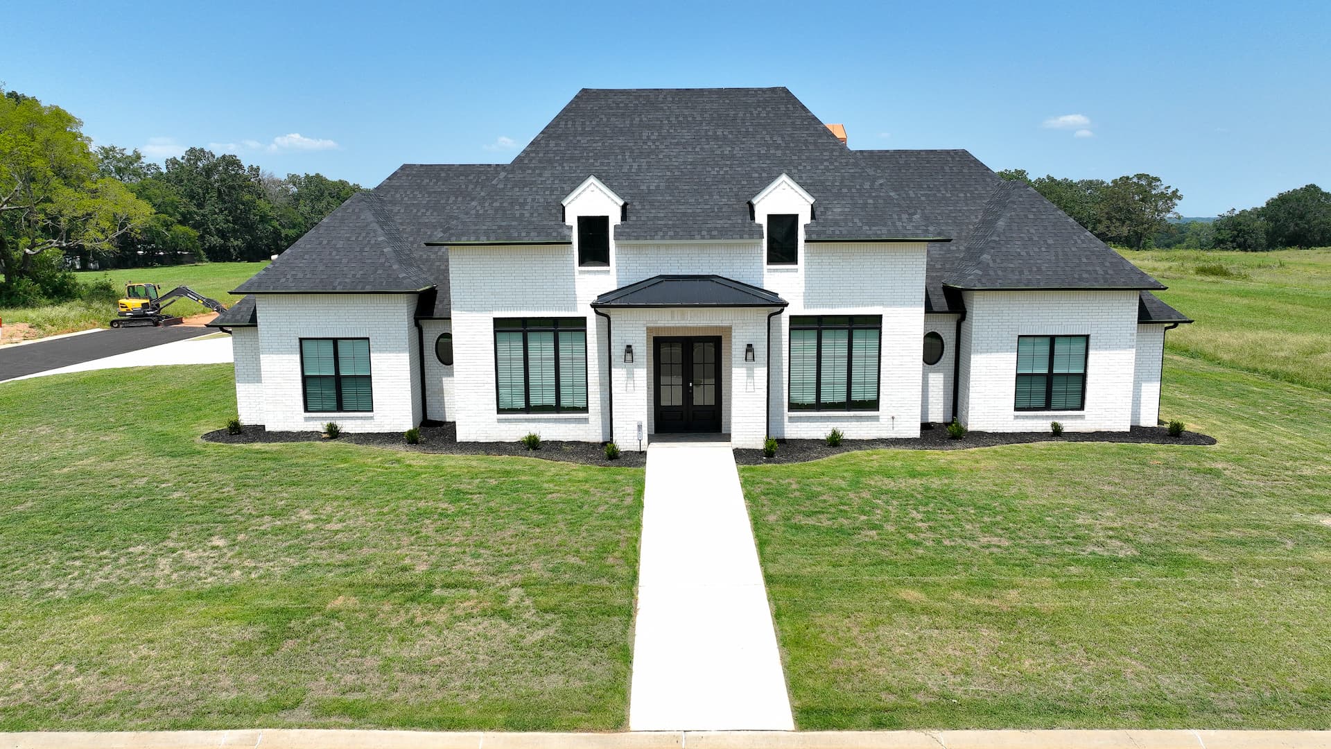 Brick home with black accents